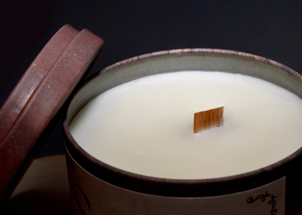 Vela aromática en frasco con tapa